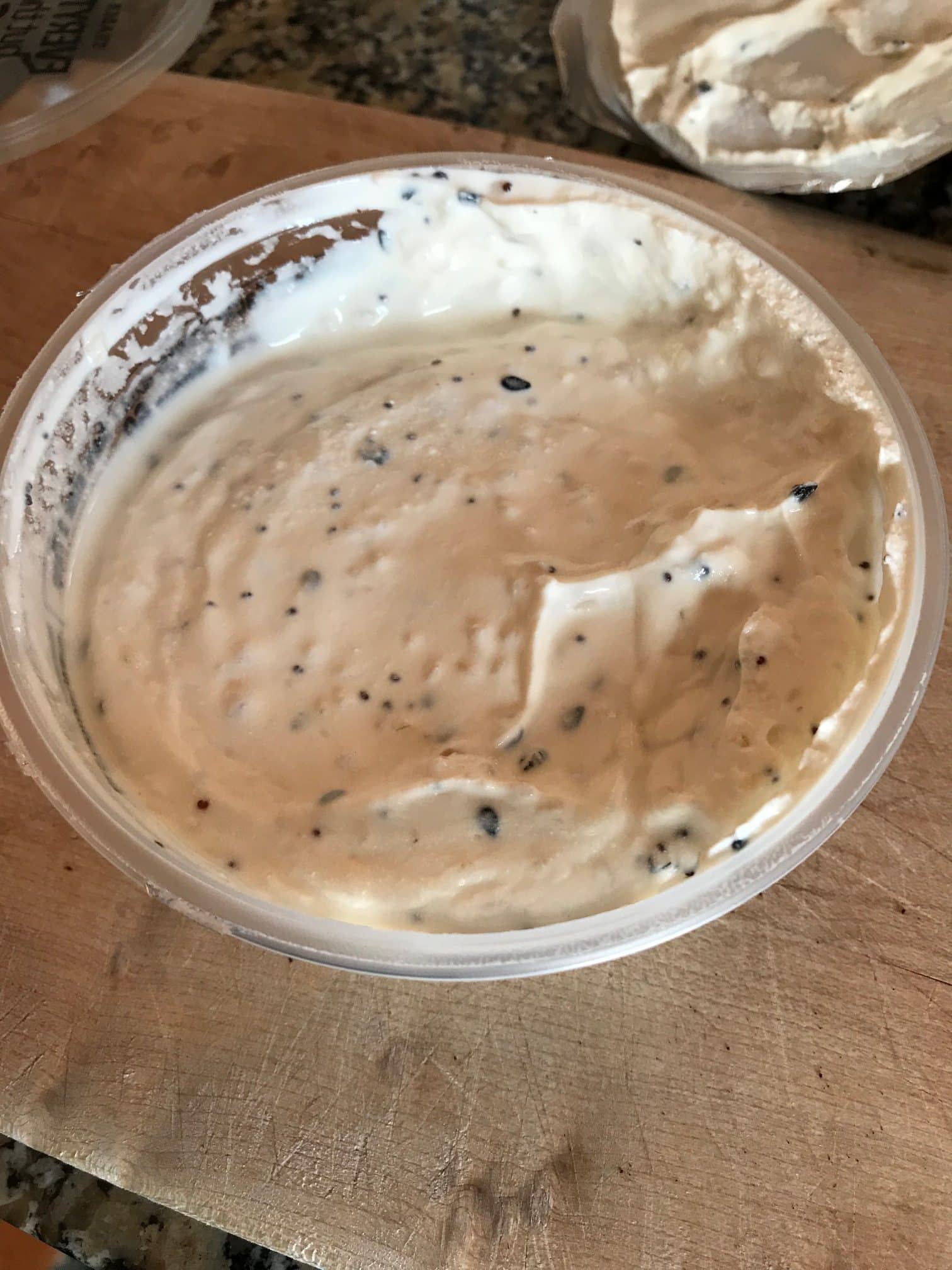 Open container of Trader Joe's Everything but the Bagel Greek Style Yogurt Dip