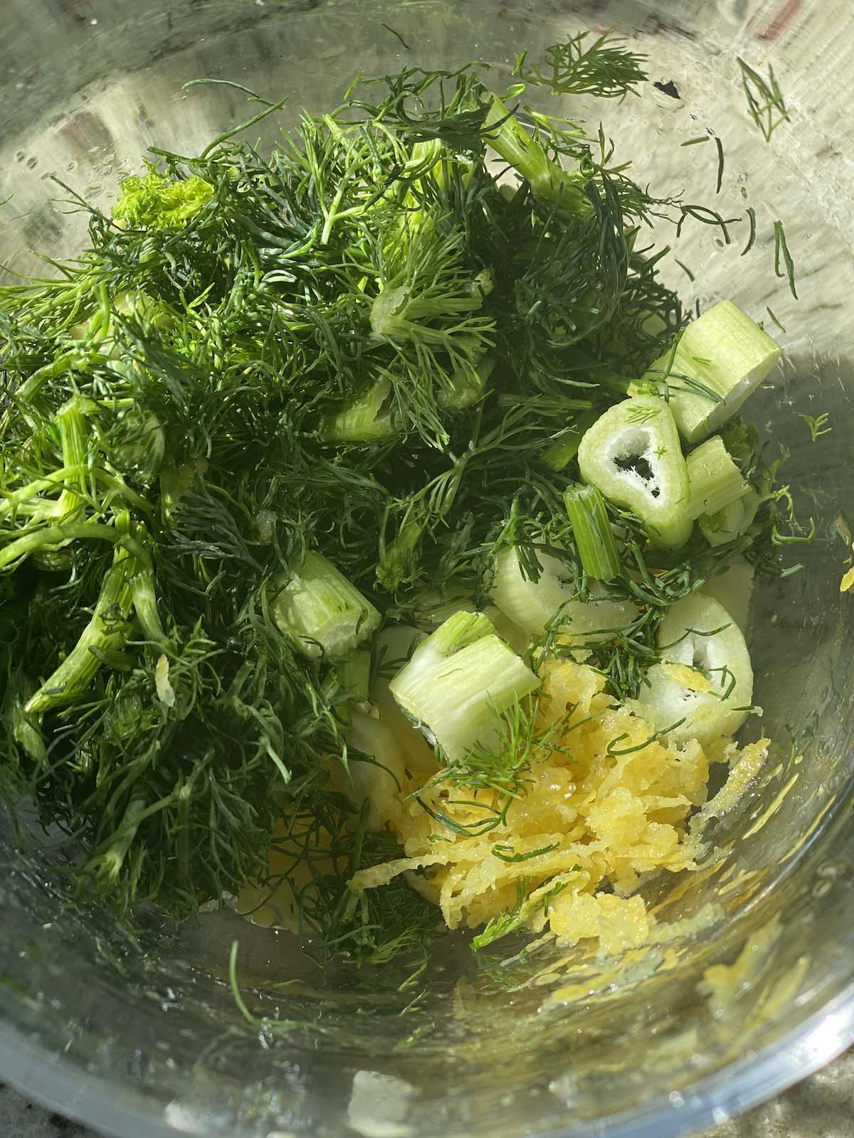 chopped dill, fennel fronds and lemon zest.