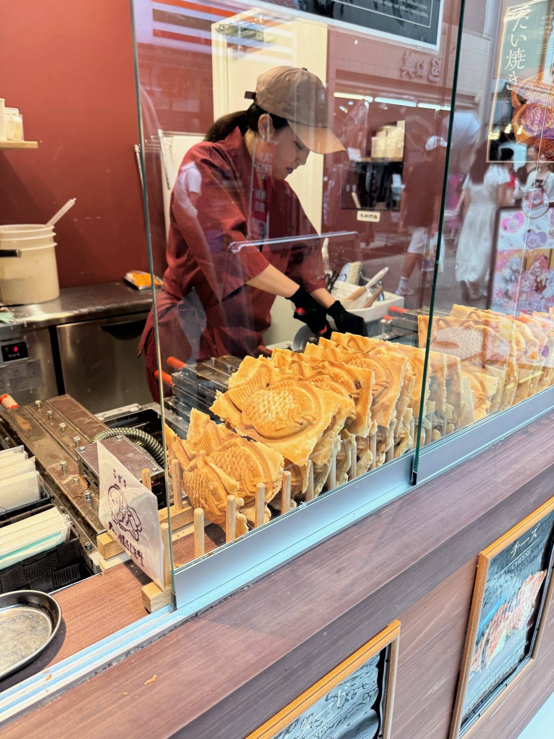 Taiyaki street vendor at the old Tsukiji fish market Tokyo