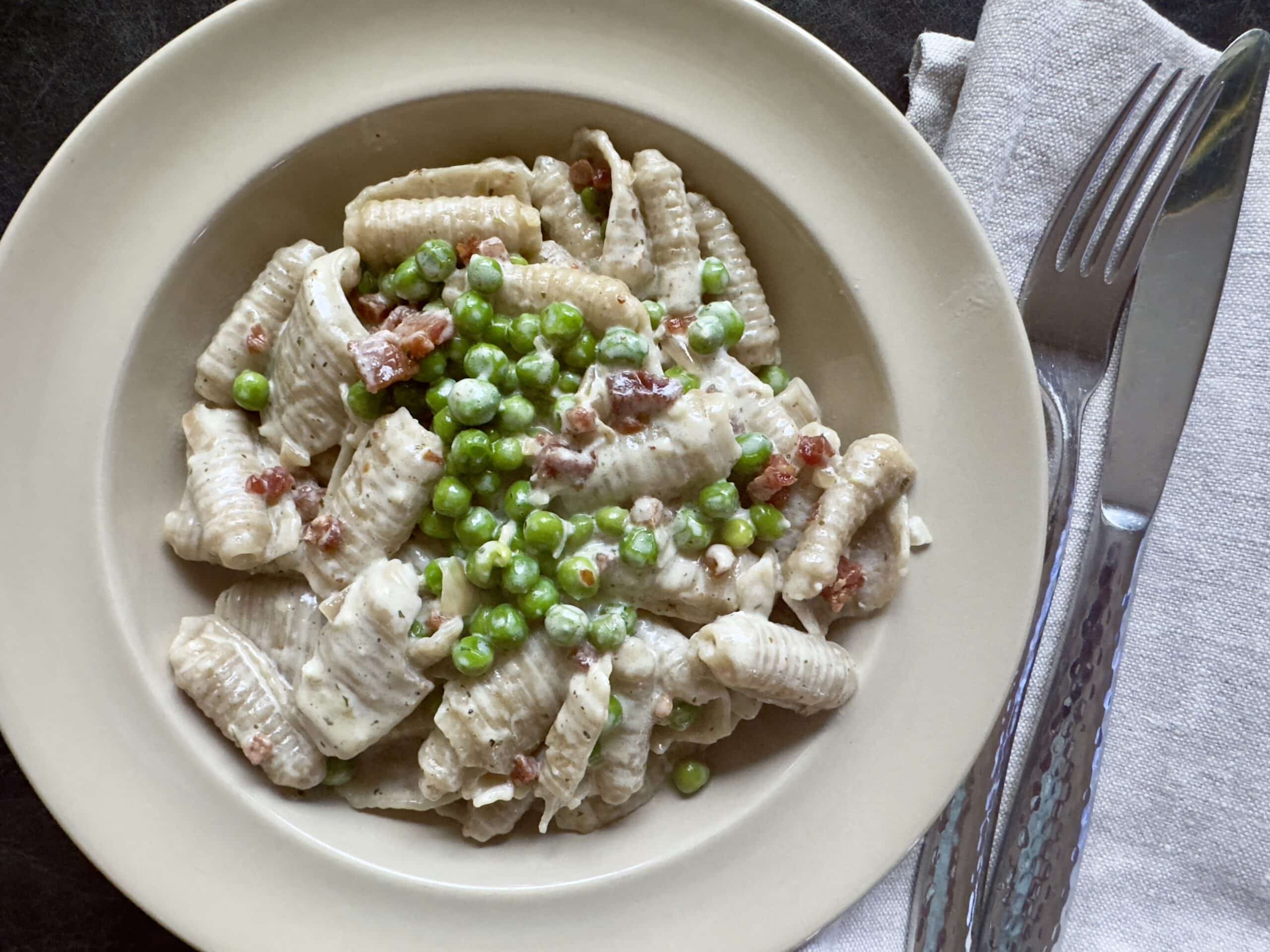 Trader Joe's barilottia pasta in a creamy sauce with peas and pancetta
