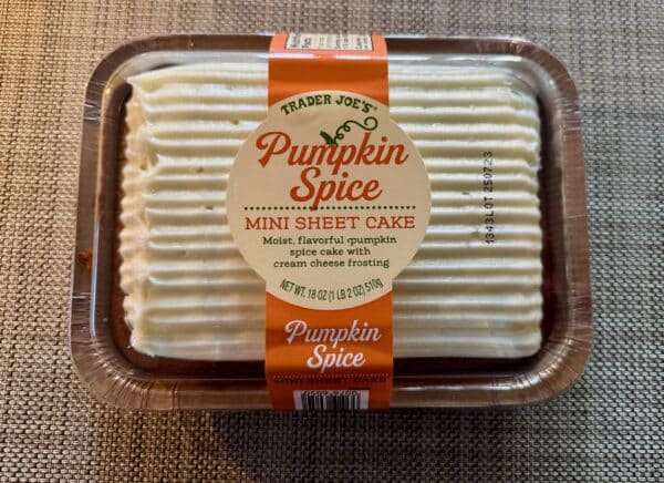 Trader Joe’s Pumpkin Spice Mini Sheet Cake in its tray topped with thick cream cheese frosting