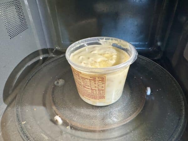 Trader Joe's Creamy mac and cheese being microwaved