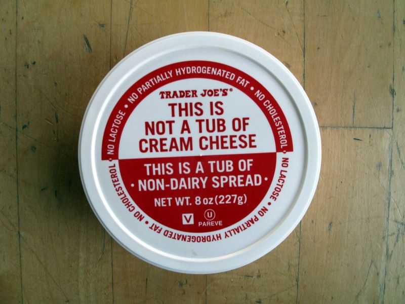 Lid of Trader Joe's "This Is Not a Tub of Cream Cheese" non-dairy spread, 8 oz