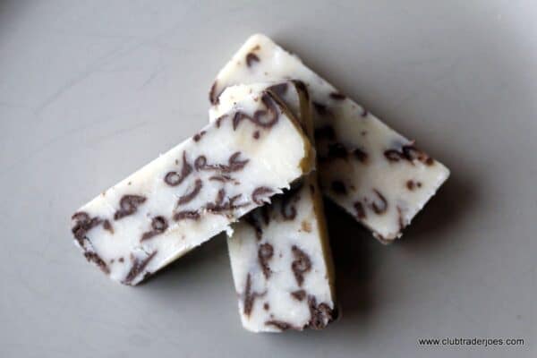 Slices of Trader Joe's Chocolate Cheddar Cheese showing the dark chocolate curls