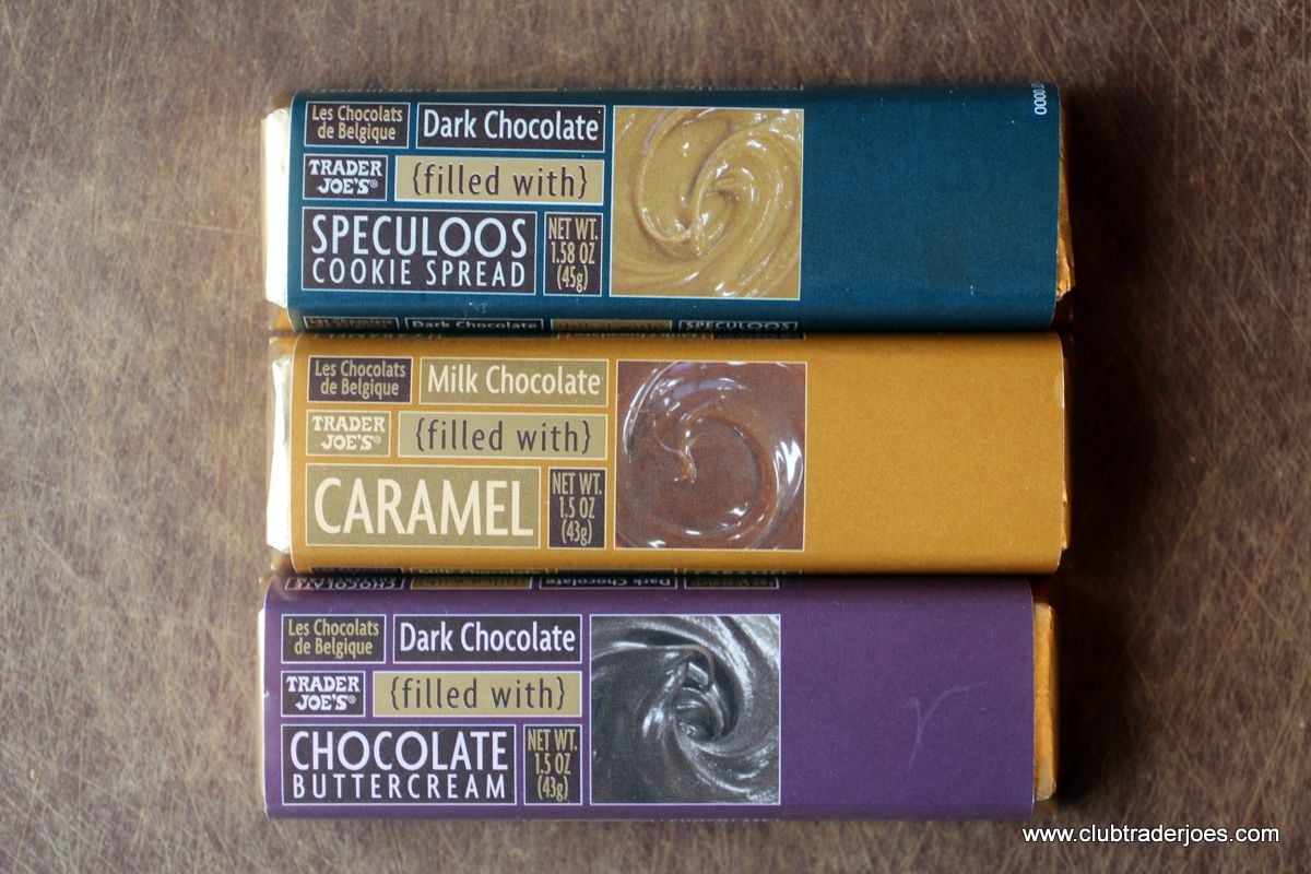 Three Trader Joe's Belgian chocolate bars: dark chocolate with Speculoos cookie spread, milk chocolate with caramel, and dark chocolate with chocolate buttercream