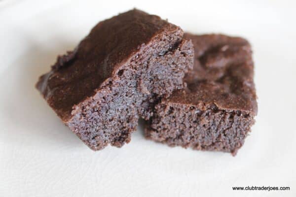 Two baked Trader Joe's Ready to Bake Brownies on a white plate