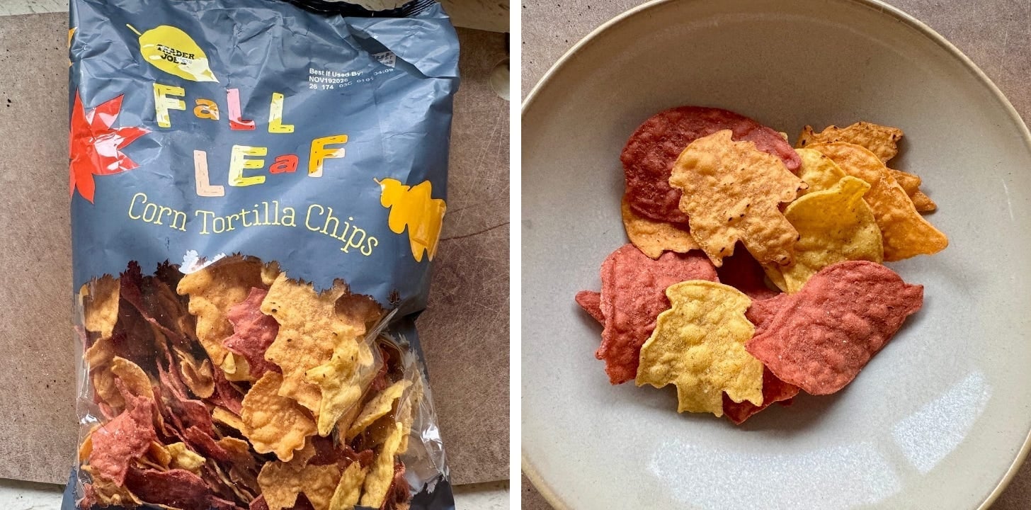 Bag of Trader Joe's Fall Leaf Corn Tortilla Chips next to a bowl of red, orange and yellow leaf-shaped chips